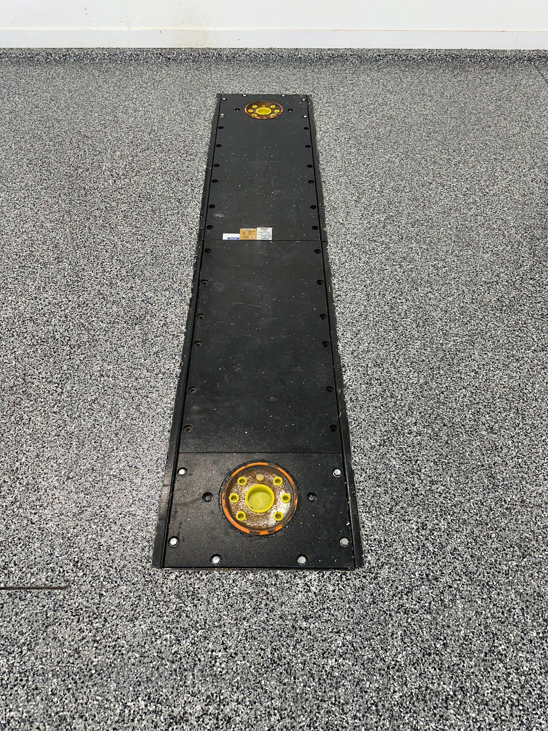 Multi-Color Epoxy Flake Garage Floor Installation in Sioux Falls by Select Painting, Coatings & Garage Cabinets