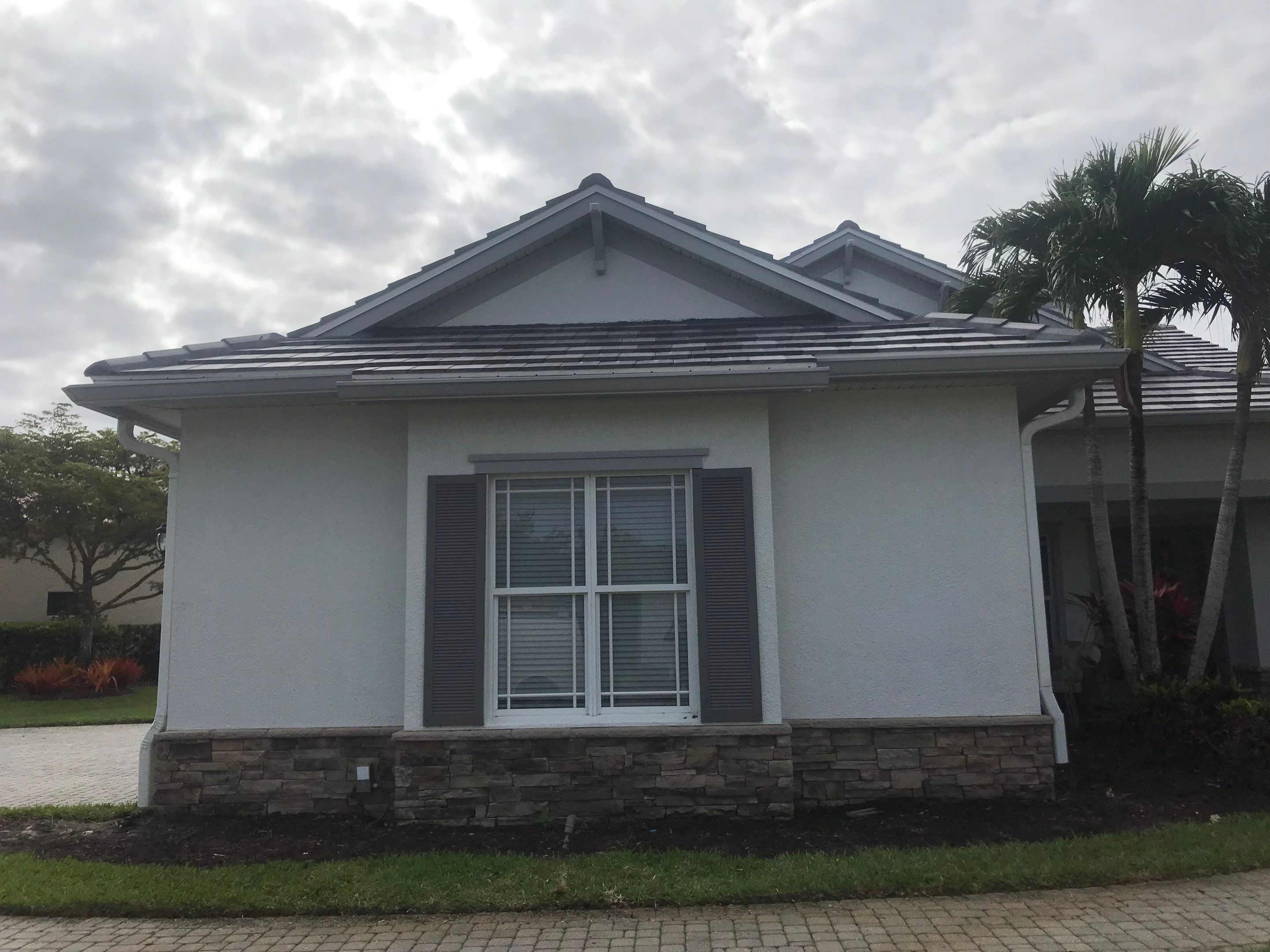 7-inch Grey Gutter Installation and White Downspouts in Fort Myers FL  by Gutter Professors