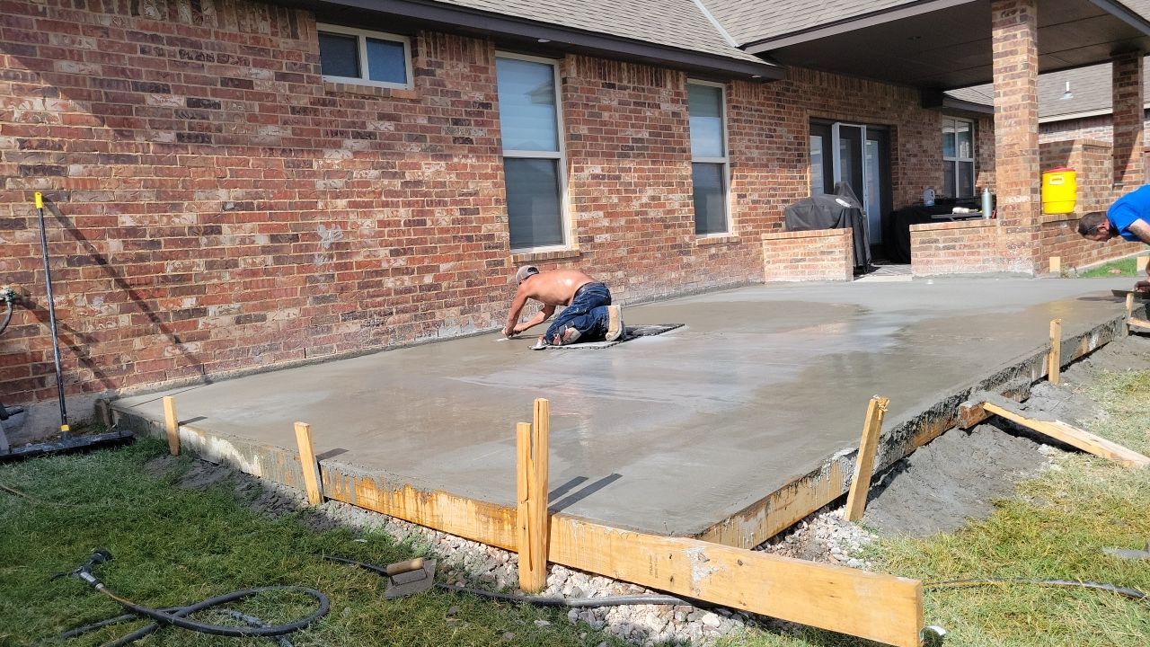 Concrete slab with Pergola by Clays Services Inc