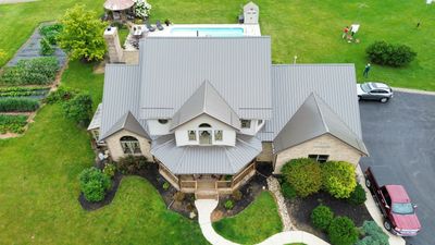 Residential Roofing Installation using Performance Panel Metal - Burnished Slate