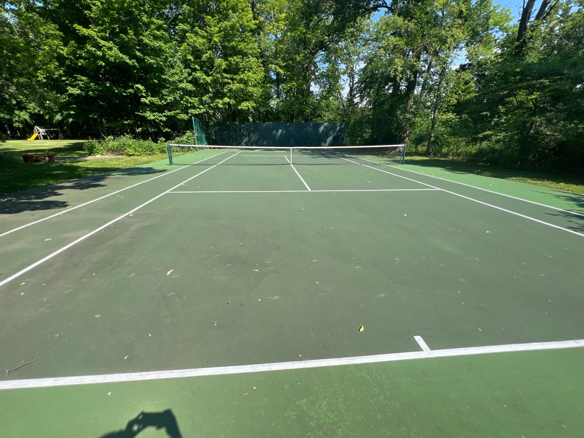 Deck, Patio, and Tennis Court Cleaning by Northern Power Washing LLC.