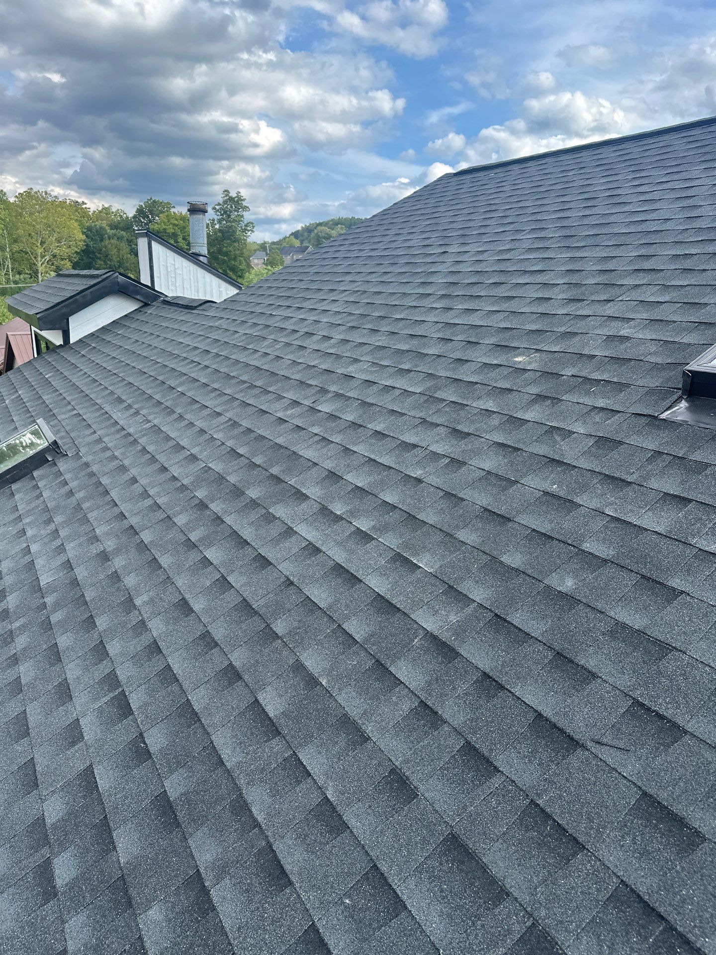 Residential Roofing Installation using GAF Timberline HDZ Charcoal by Rainstoppers Roofing