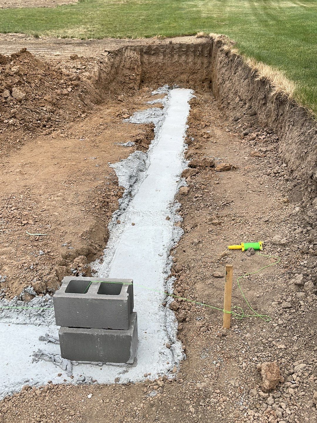 Fence / Retaining Wall using Block then parge by ACE Waterproofing & Basement Solutions