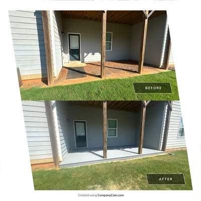Ground-Level Gray Composite Deck and Privacy Fence Installation