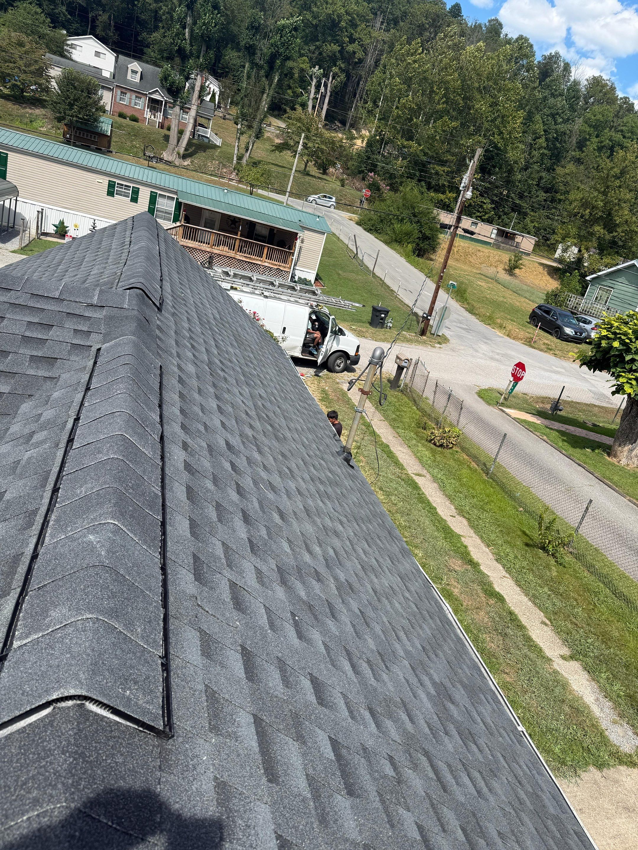 Residential Roofing Installation using GAF Timberline HDZ Charcoal by Rainstoppers Roofing
