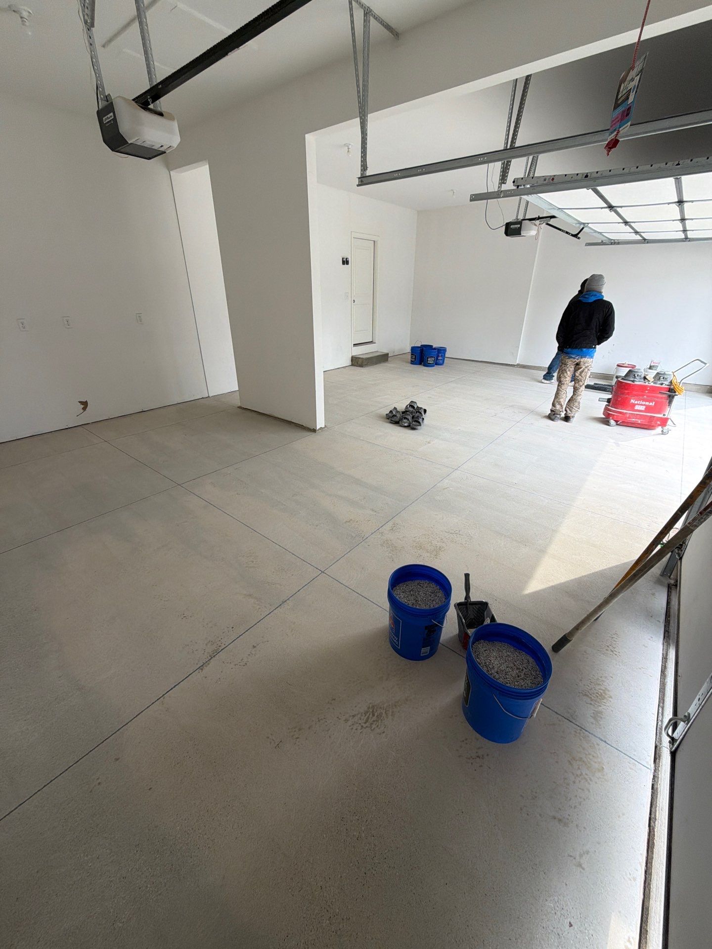 Multi-Car Garage Epoxy Flake Floor Installation in Byron Center by Gordon Painting