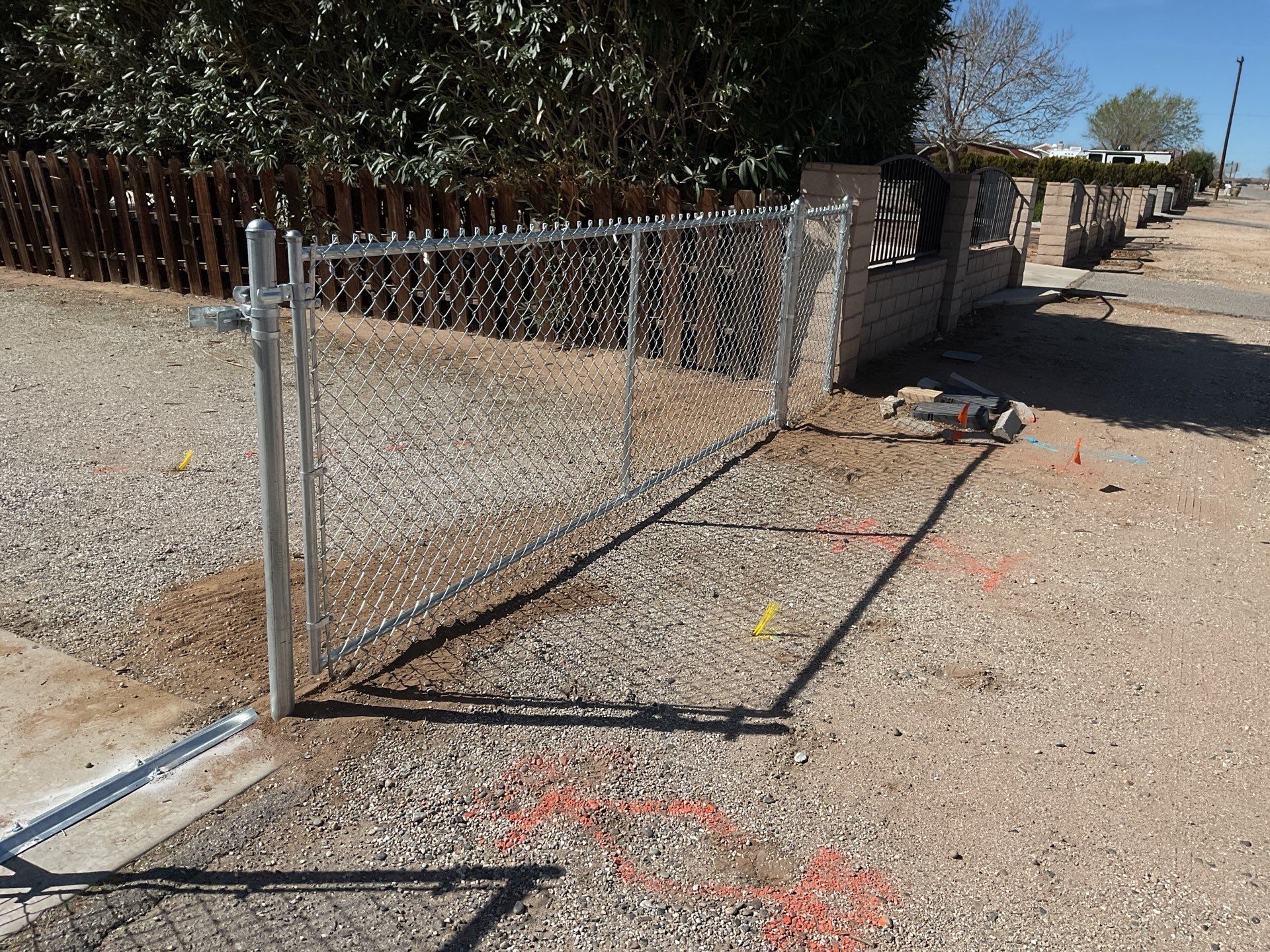Fence Installation using chain -link by Fence Guys Inc.