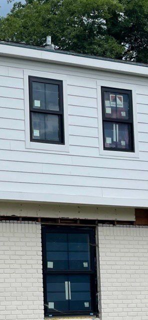 Siding Replacement using Hardie Plank S8 1/4"  Arctic White by 180 Contractors