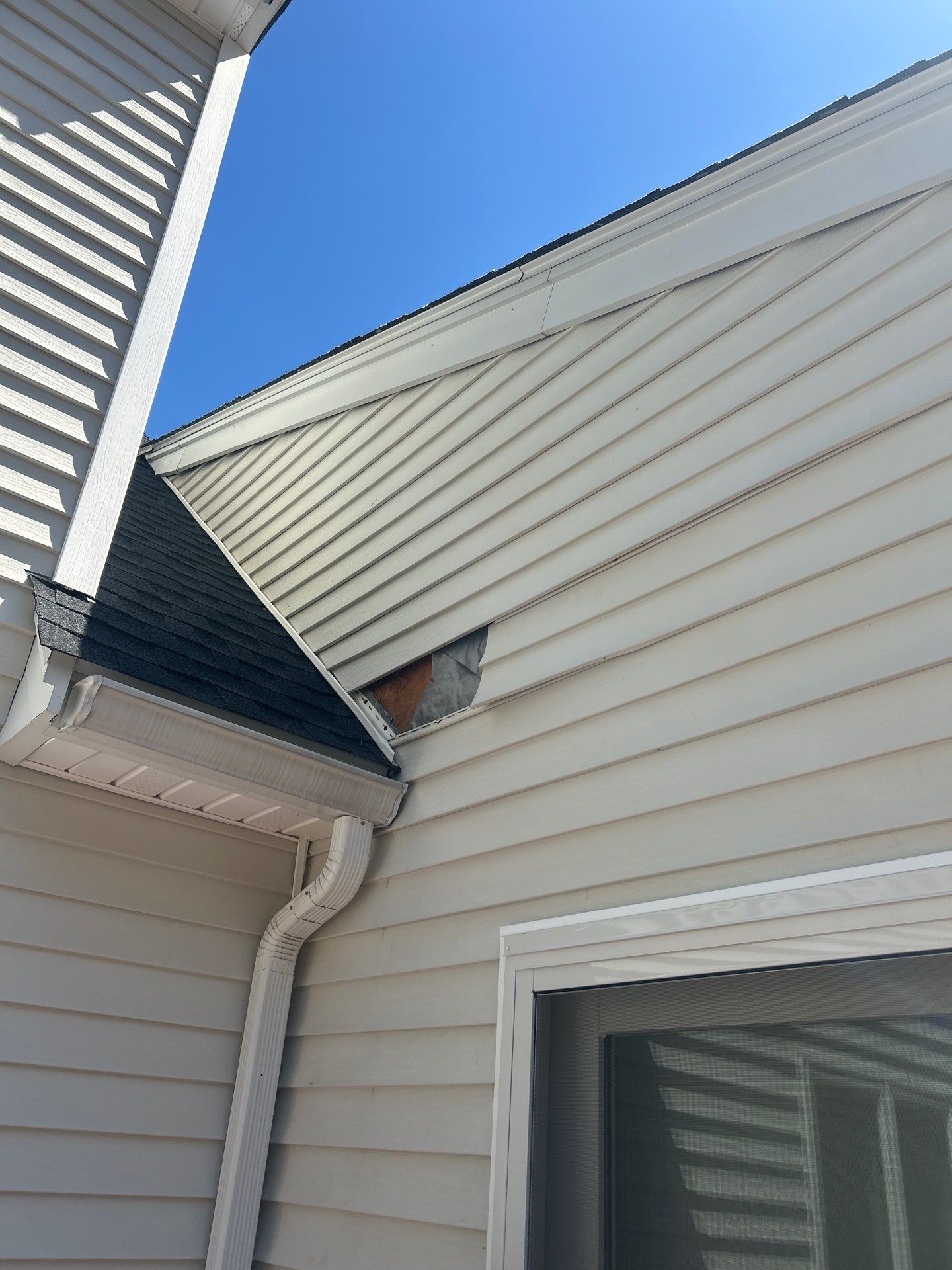 Vinyl Siding Repair with Spot Replacement by Mighty Dog Roofing of Greater Middlesex County