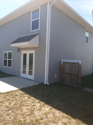 Gutter Installation Using White K-Style Seamless Gutters