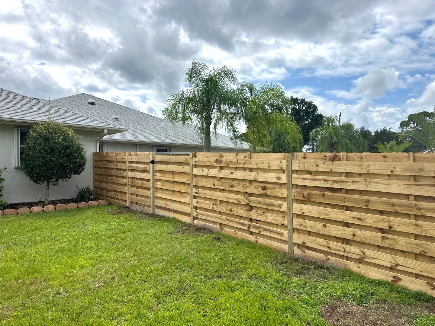 Wood Fence Installation using Wood Pressure Treated Fence  by Asap fence and gates, LLC