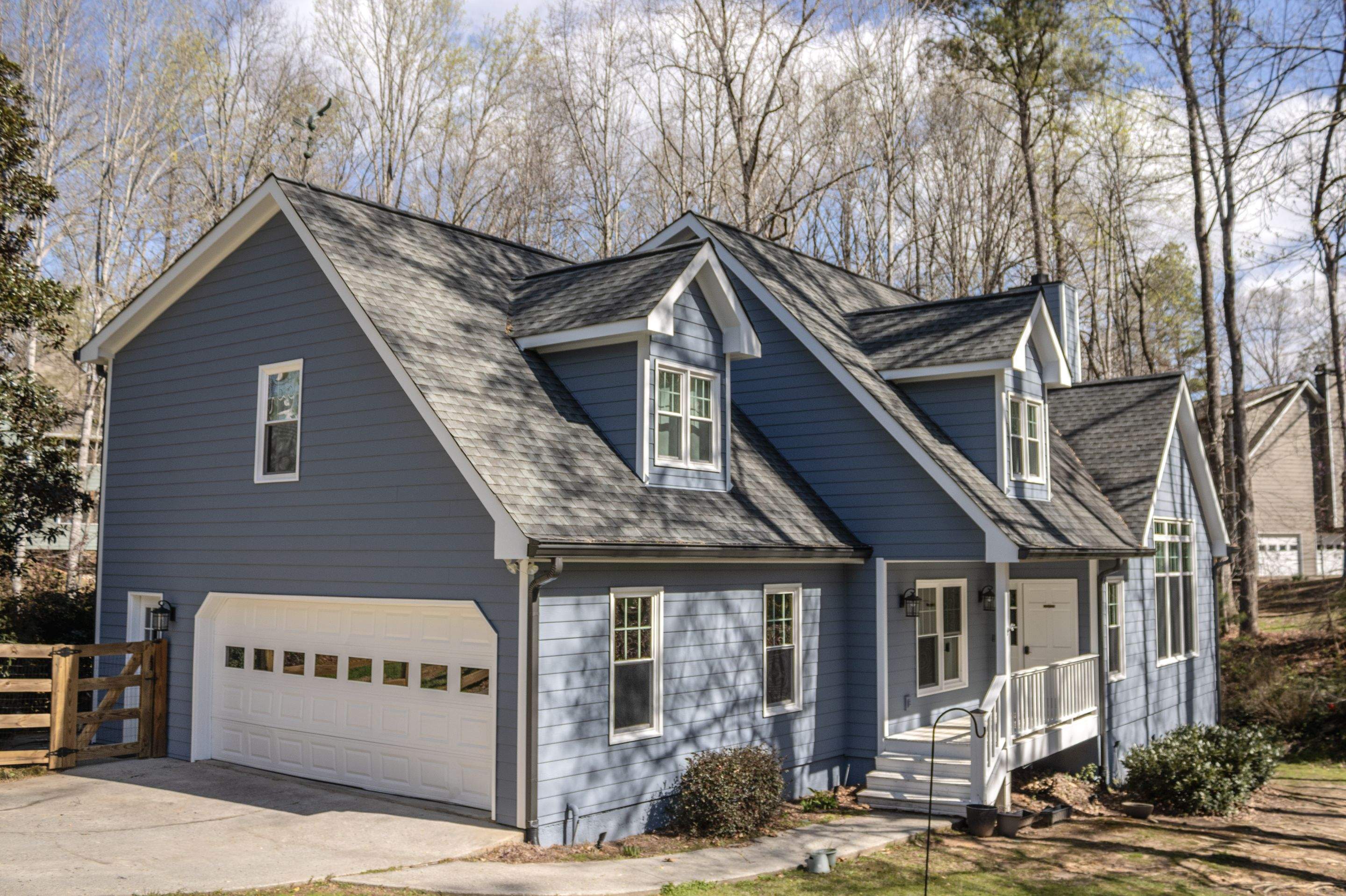 Marietta, GA Full Siding Replacement, 30+ Window Replacements, Screened-In Porch to Sunroom Conversion, Gutter Replacement, and Exterior Painting by Nelson Exteriors