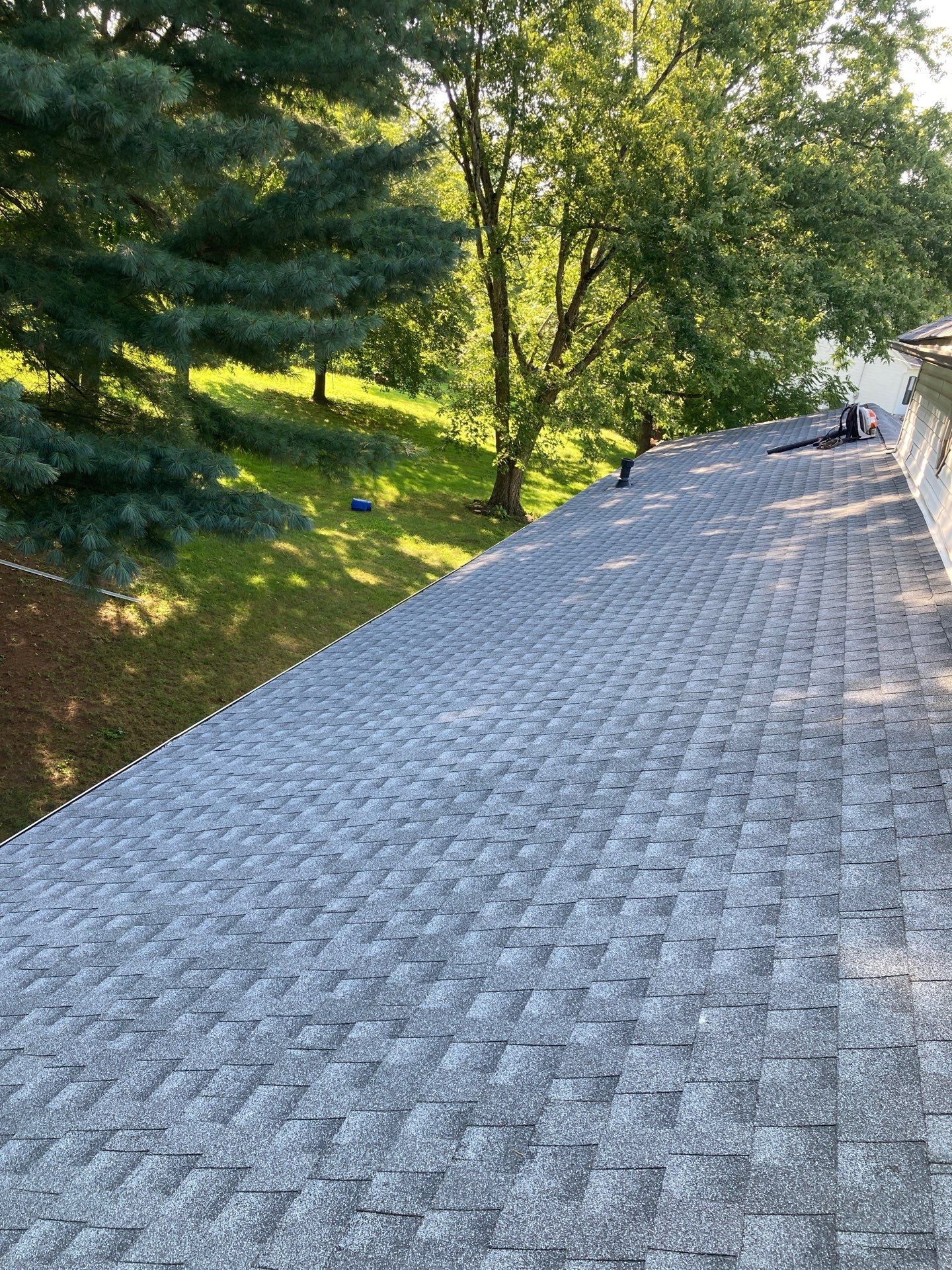 Residential Roofing Installation using GAF Timberline HDZ Oyster Grey by Rainstoppers Roofing