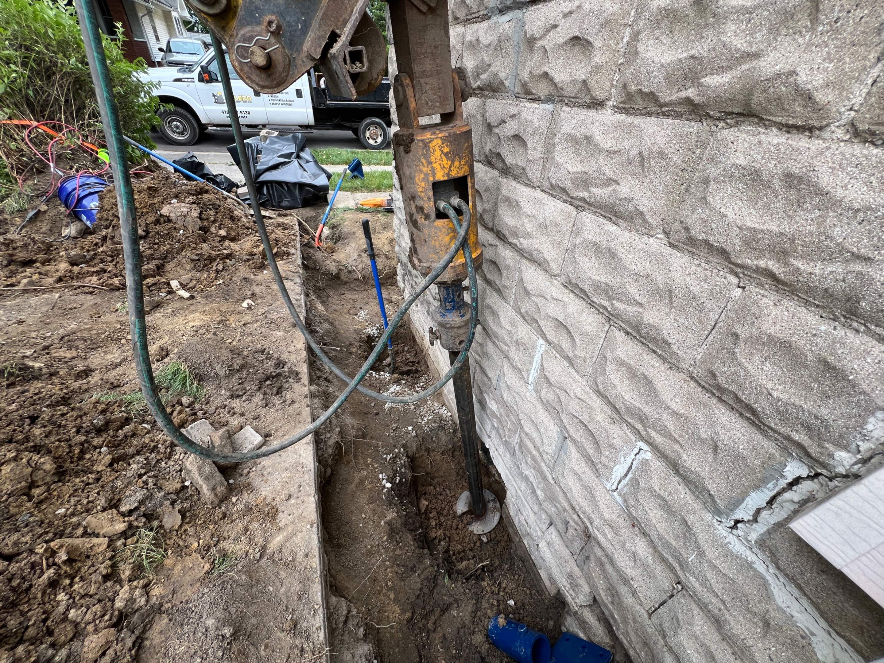 Helical Piers using Helical Deep Foundation Footings by Toledo Basement Repair