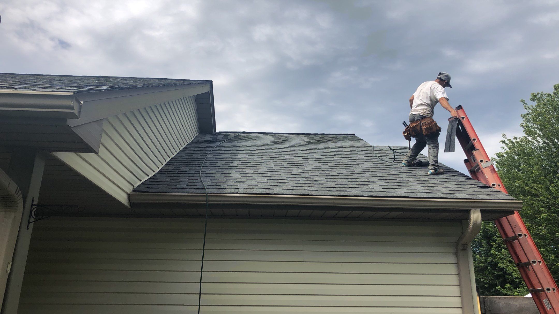 Storm Damage Restoration using Atlas Pinnacle Shingles and Mastic Vinyl Siding  by MODERN EXTERIOR SYSTEMS
