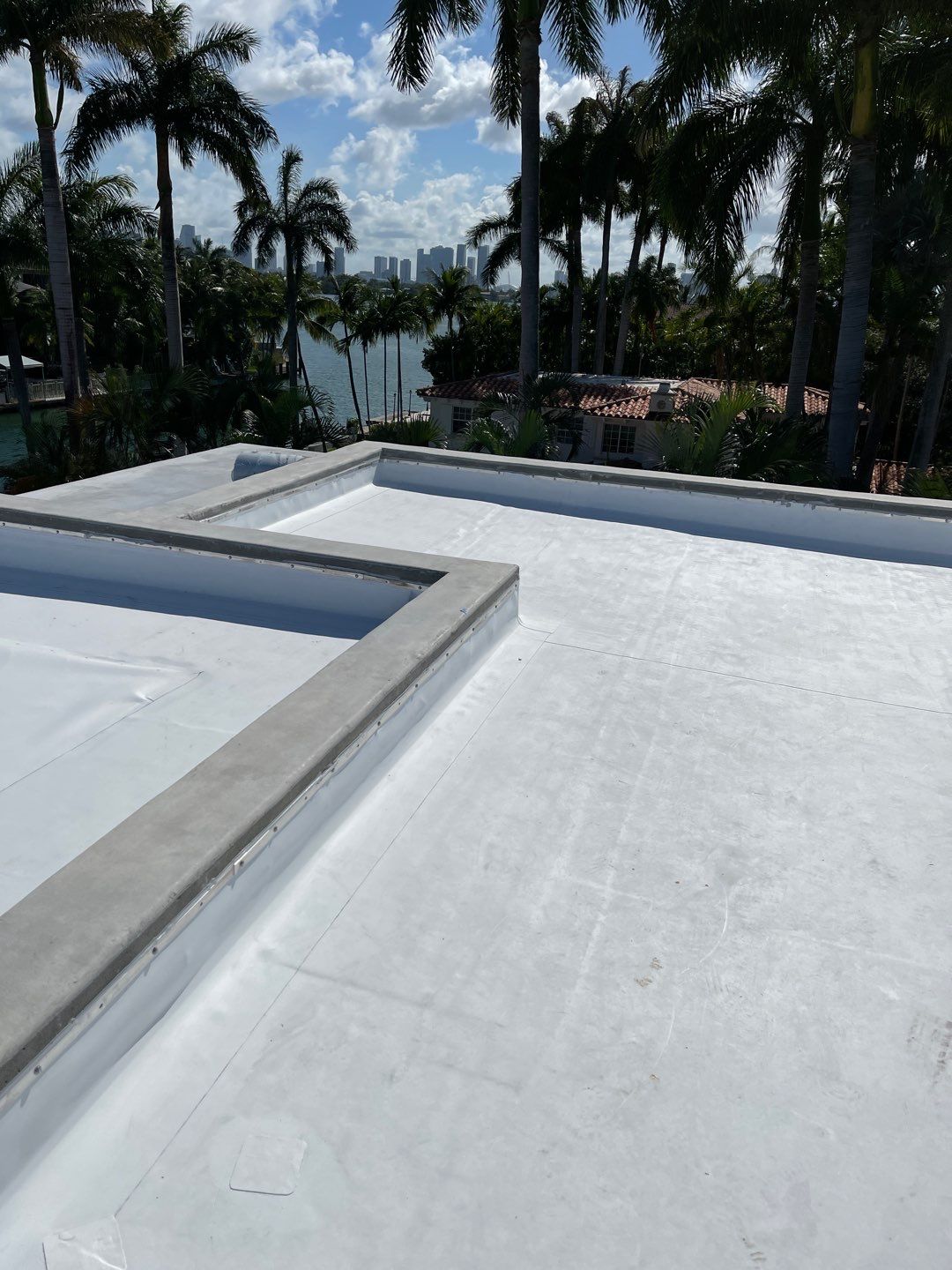 TPO Flat Roof Installation for a Miami Beach Commercial Residence by AJF ROOFING INC