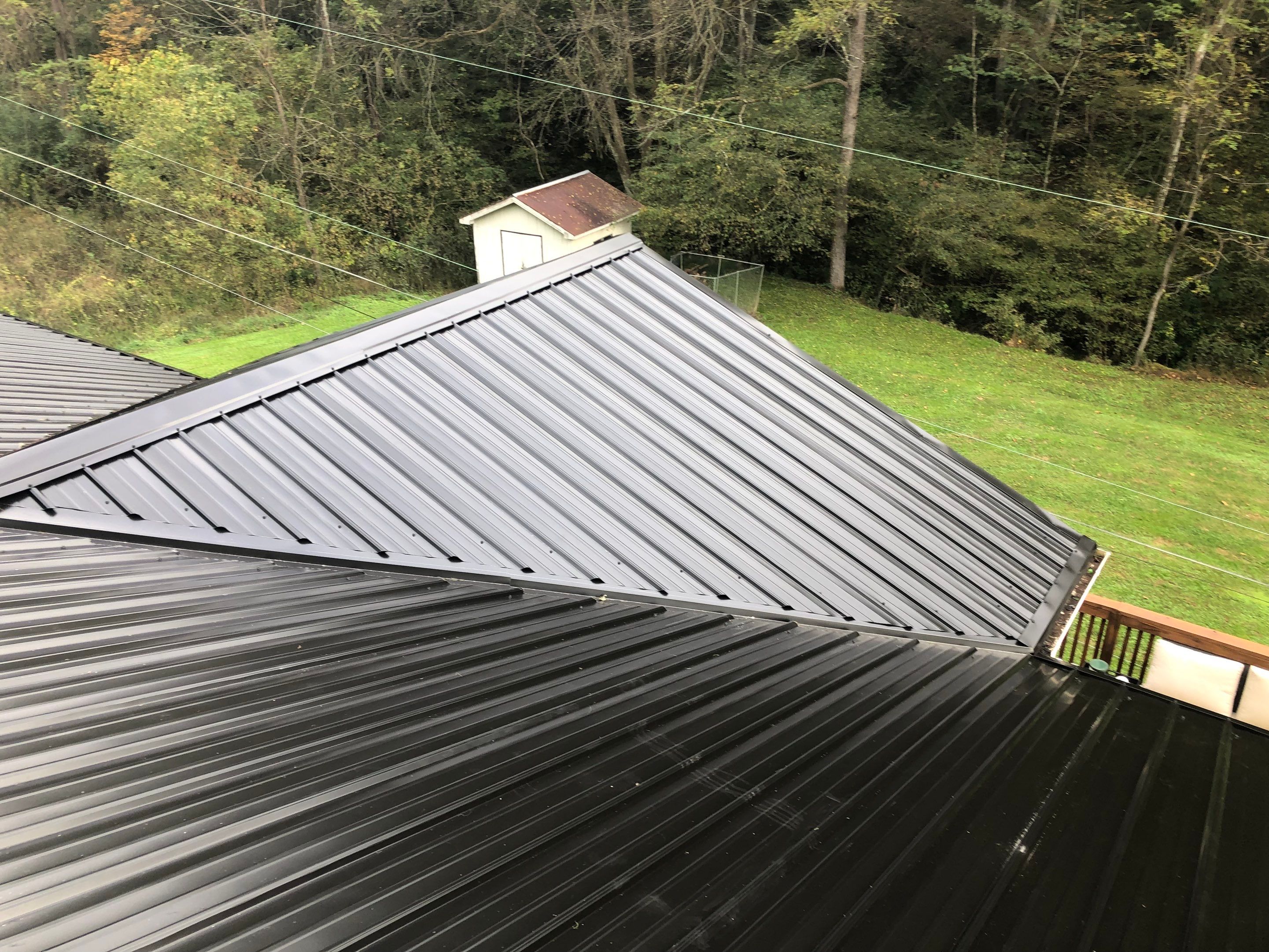 Metal Roof and Vinyl Siding, Soffit, Gutters using LifeTite Premium metal roofing  by Secure Construction Company Inc