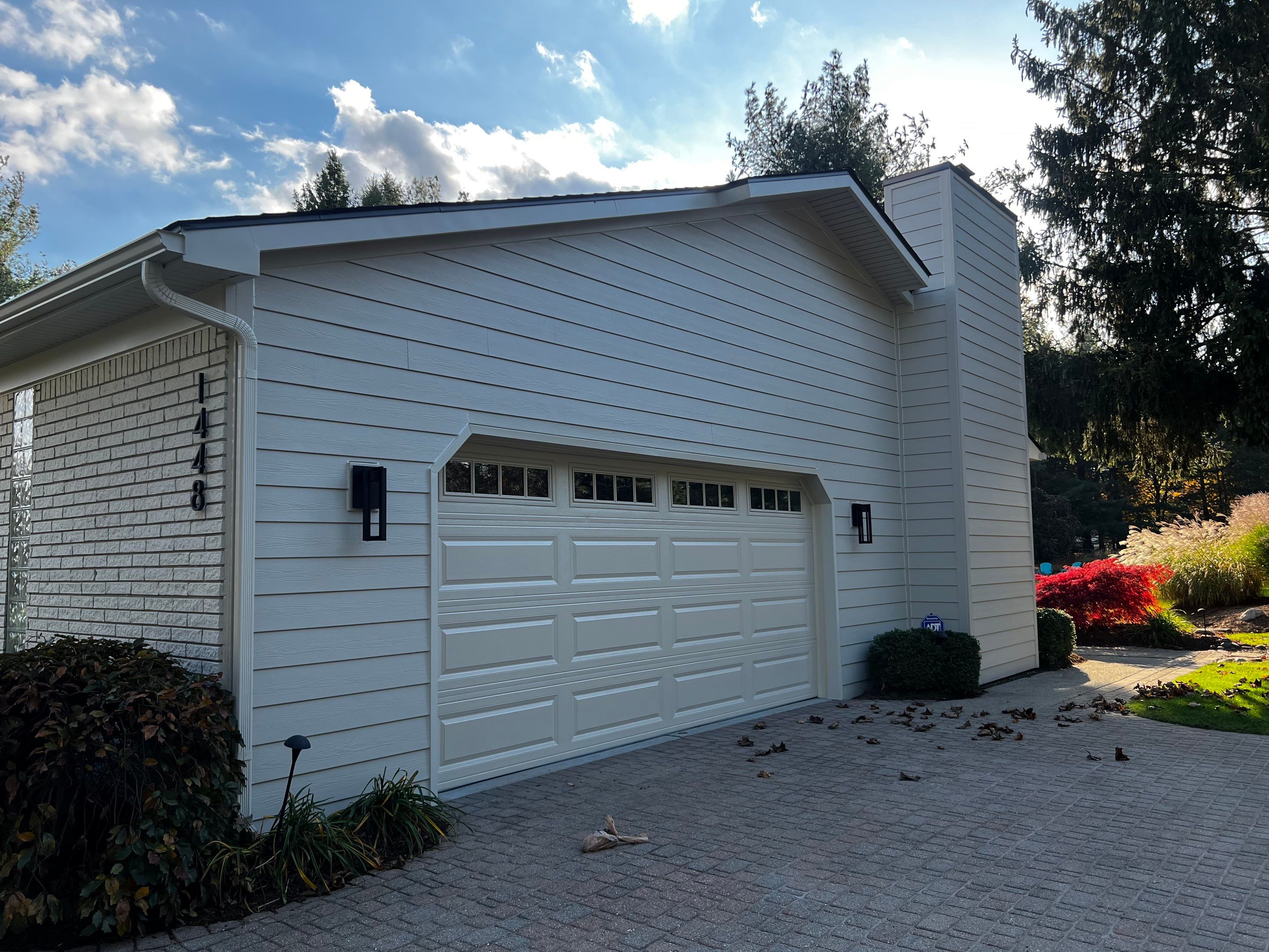Siding & Roof Replacement by Bloomfield Construction & Restoration