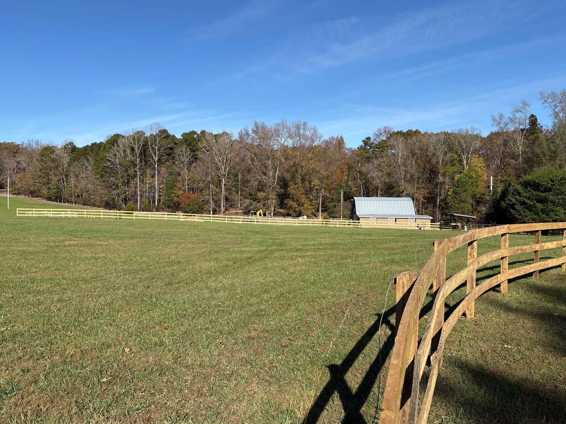 Fence Staining (Farm in Durham NC) by GonzalezPainters & Contractors Inc 