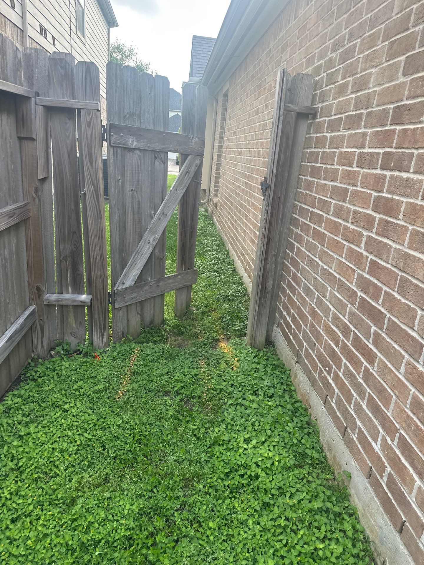 Wood fence with alternating panels by Tim's Fences