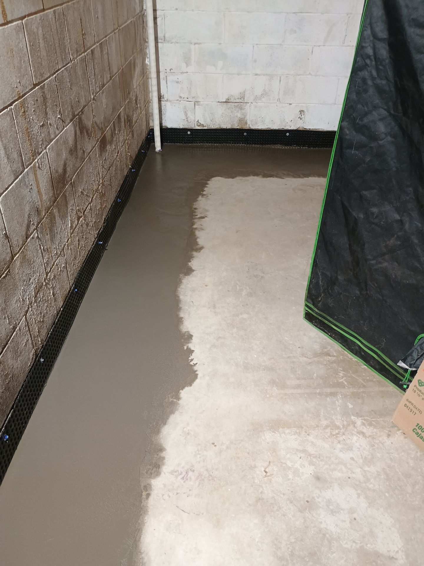Interior Drain Tile Installation near Columbia Heights, MN by Waterproofing Northeast