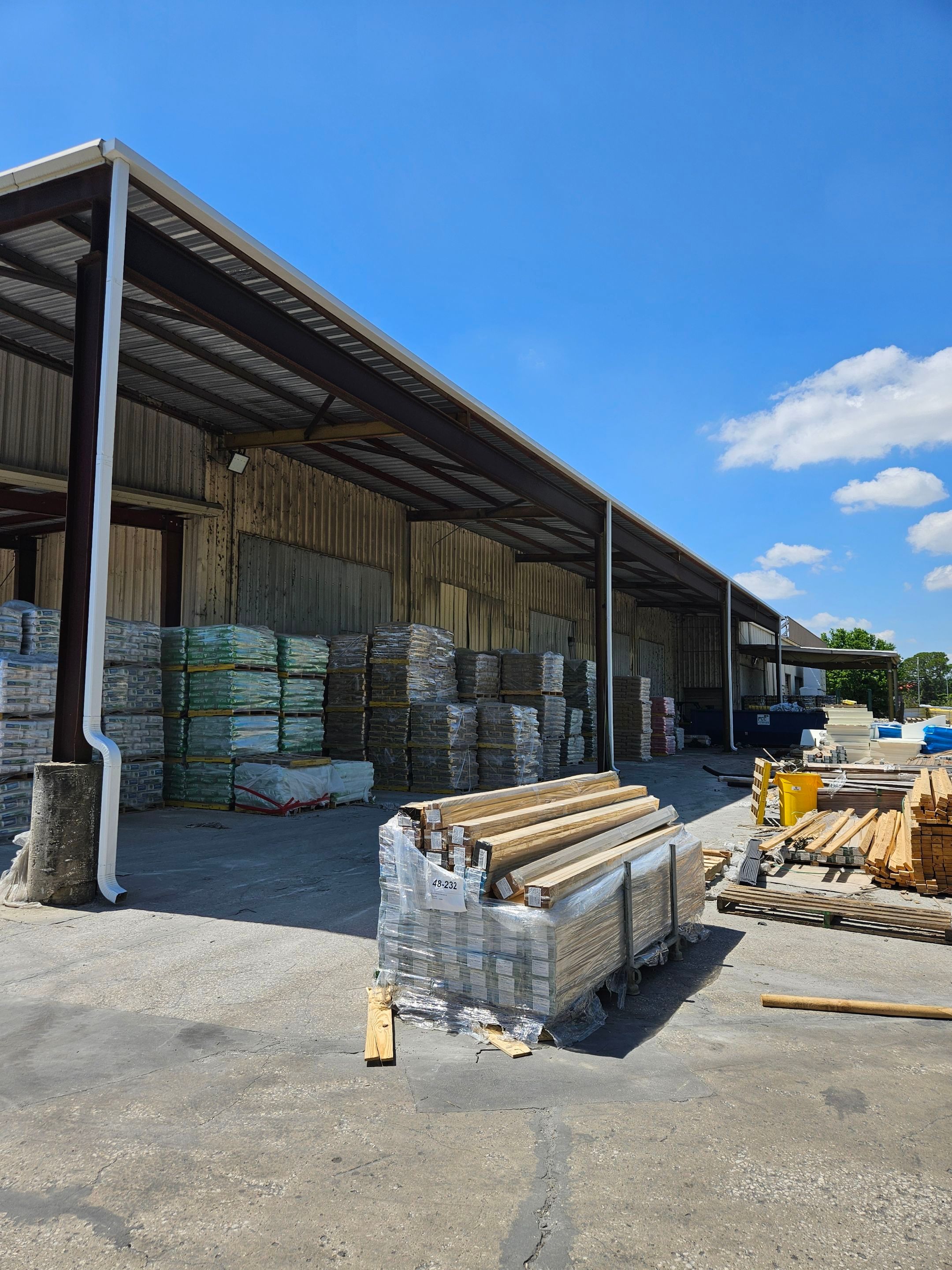 Commercial Box Gutters and White Downspouts Installation in Tampa FL by Gutter Professors