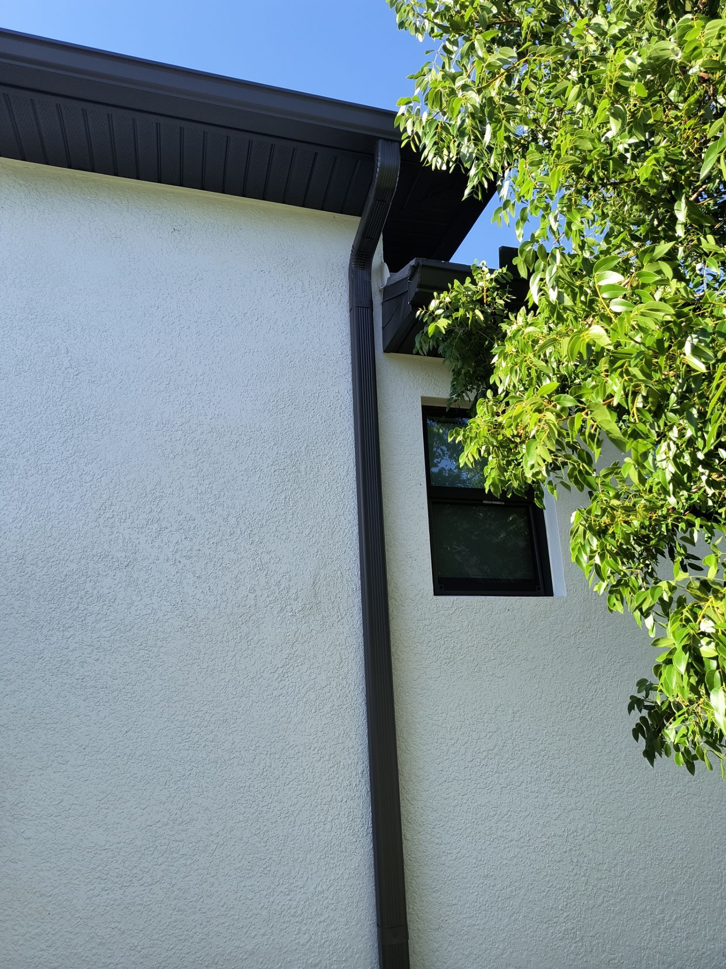 Dark Bronze 7-Inch Gutter Installation in Cape Coral FL by Gutter Professors