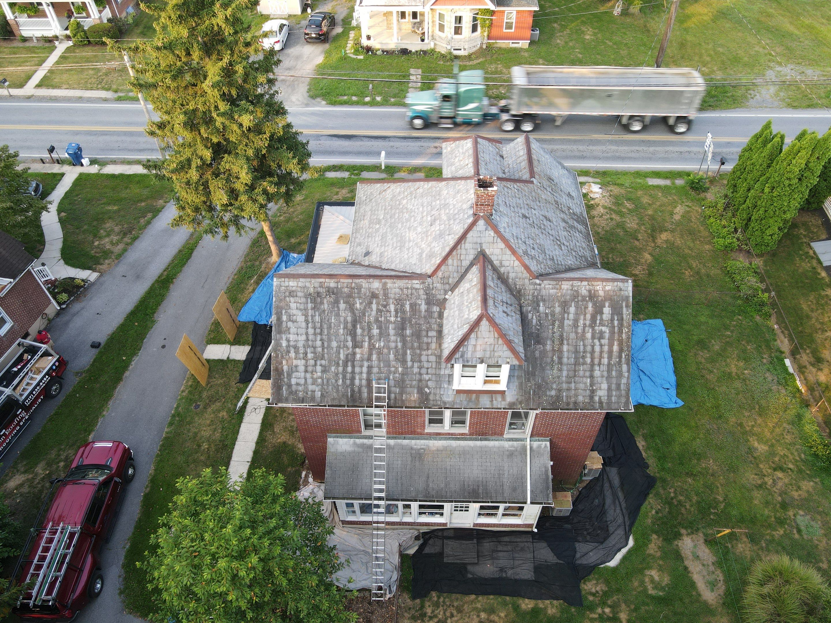 Slate Roof Removal  by Teflon Roofing