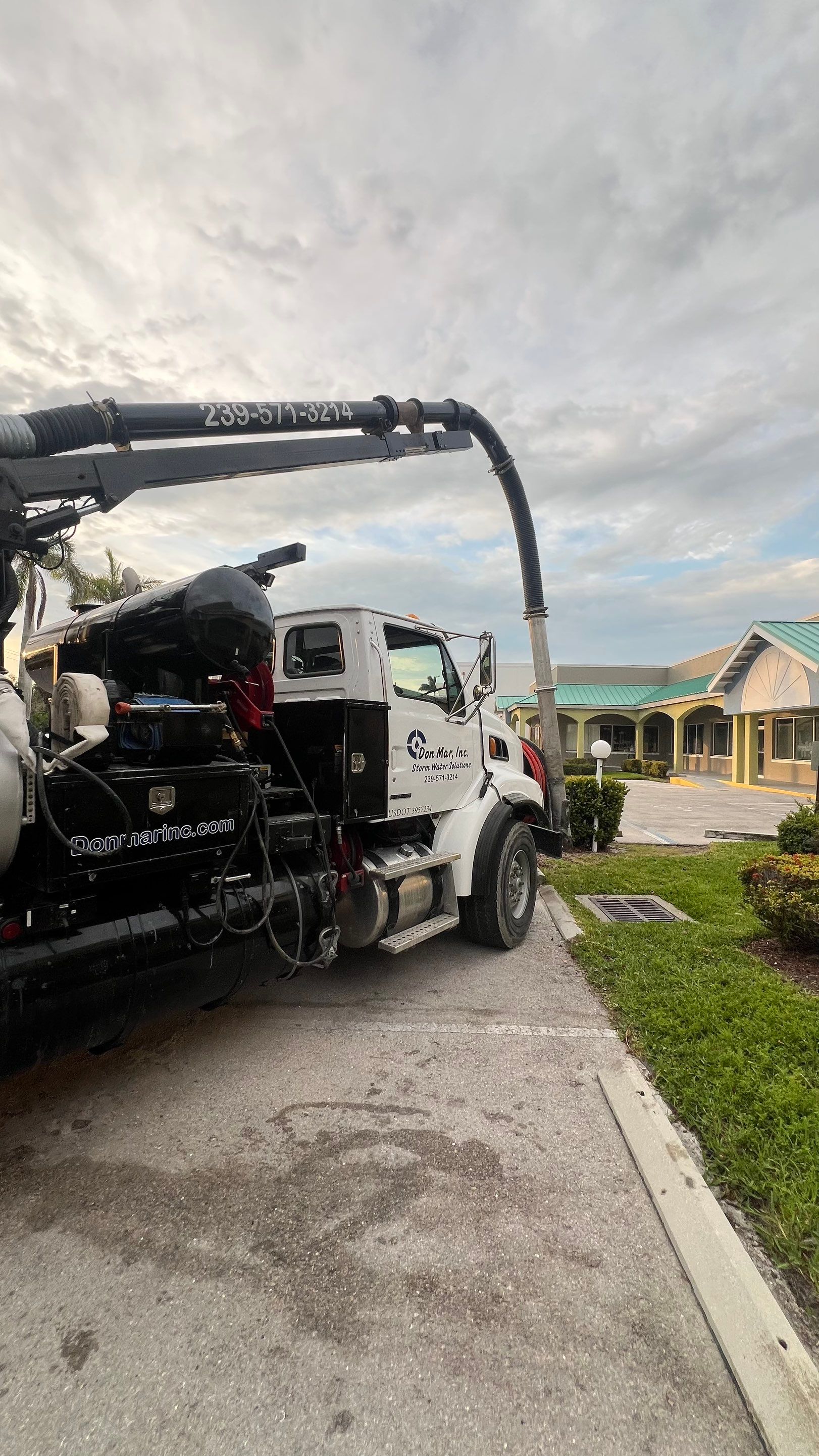 Stromwater System Maintenance at Bill Smith Appliances / Critter Cafe Marco Island Catch Basin by Don Mar, Inc. Storm Water Solutions