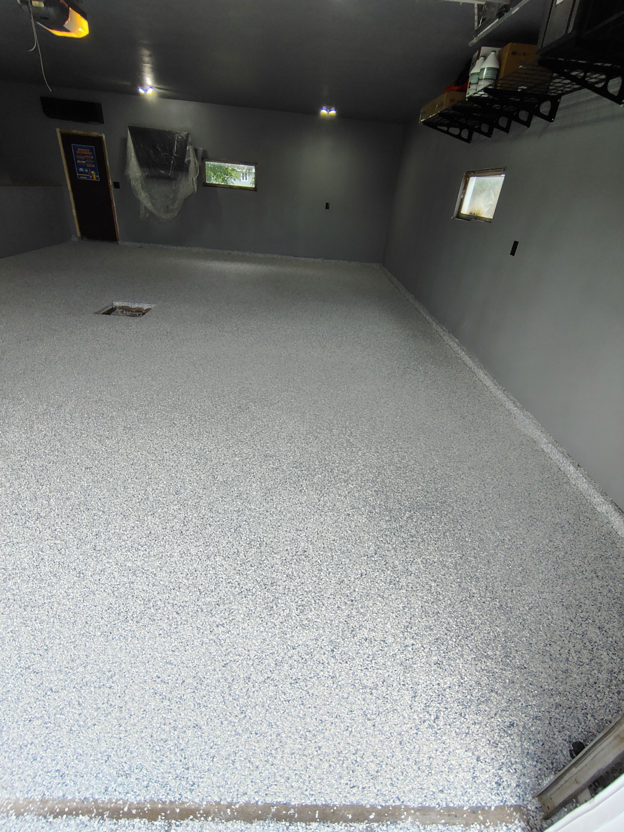 Garage Floor Concrete Coating and Surface Restoration in Colman by Select Painting, Coatings & Garage Cabinets