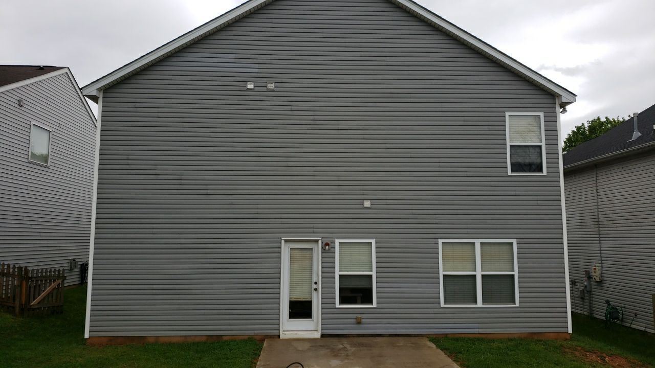 House Wash using cleaner by Power Wash Masters LLC
