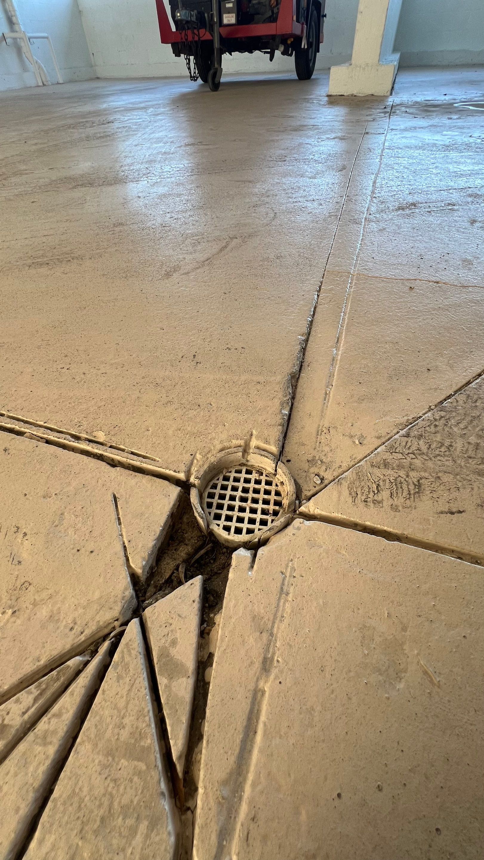 Isles of Capri Condo Parking Garage Drainage System Cleaning by APS Power & Water