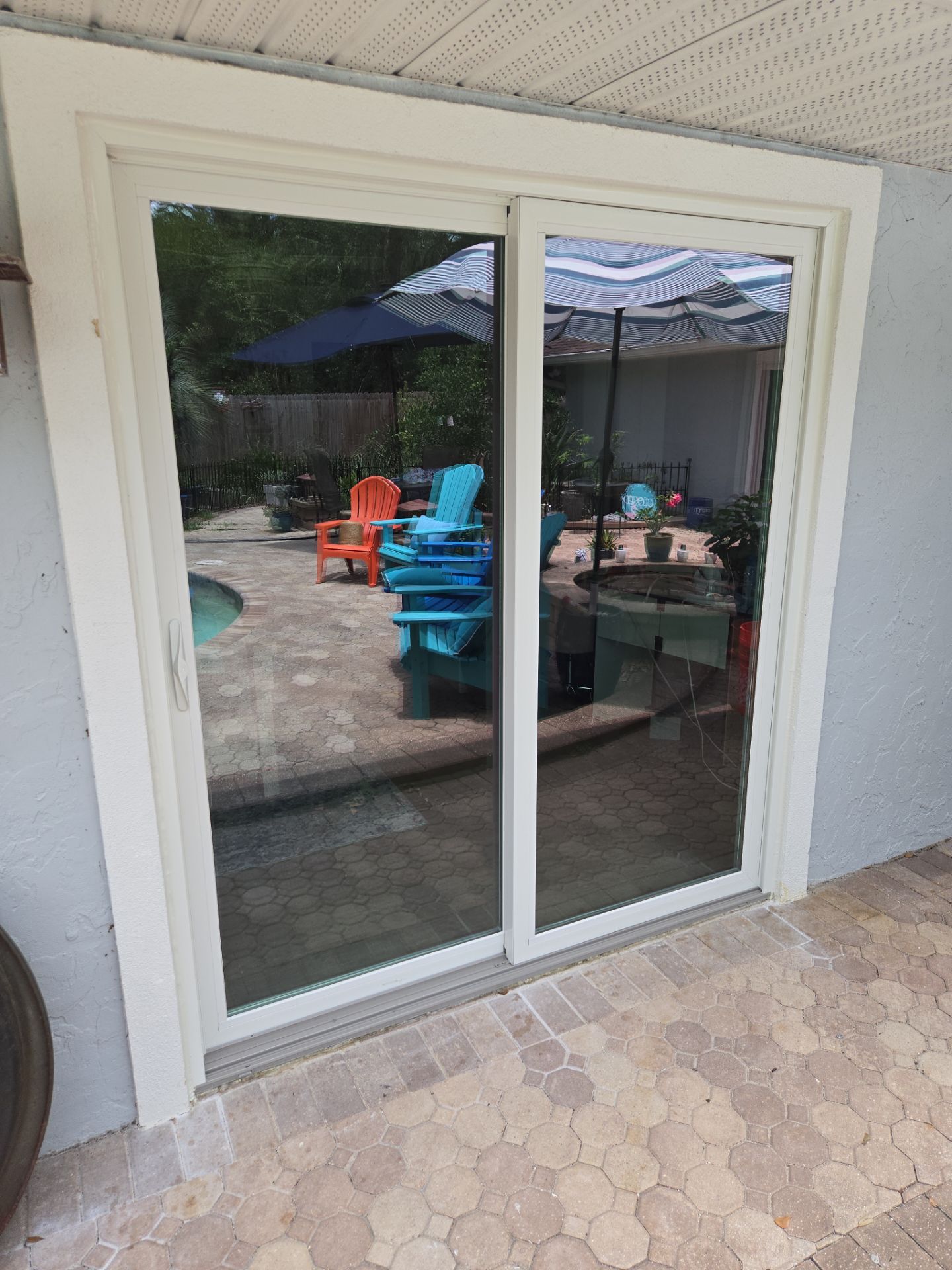 Custom Sliding Glass Door Installation with Integrated Pet Doors in Gainesville by Windows & Doors Store