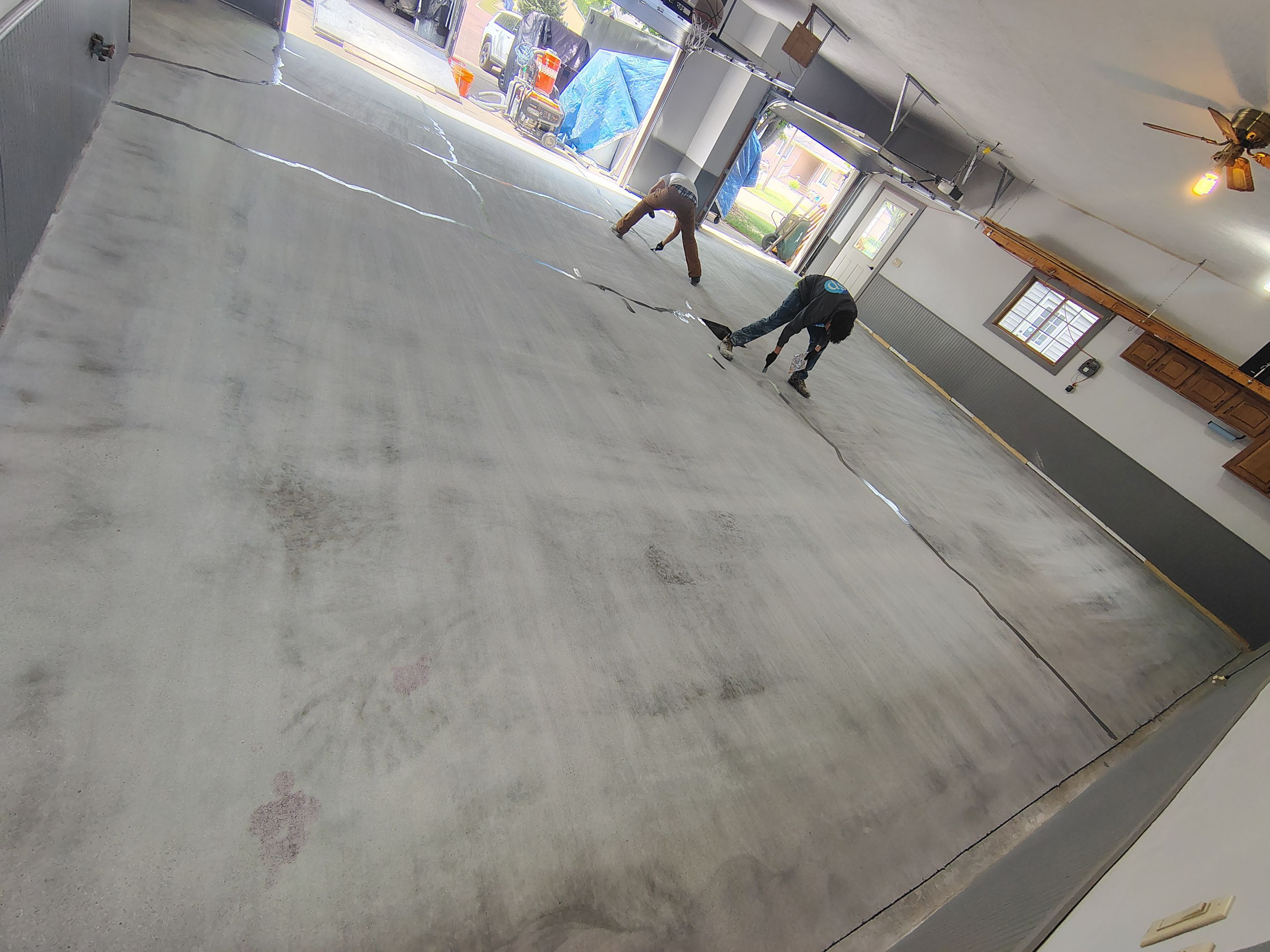 Multi-Fleck Epoxy Garage Floor Coating in Dell Rapids by Select Painting, Coatings & Garage Cabinets
