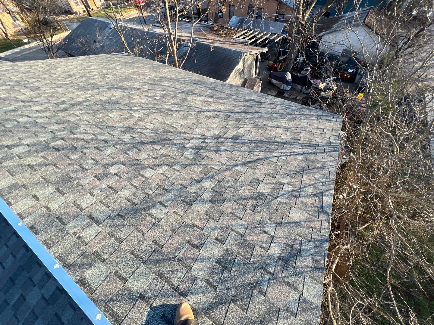 Estate Gray Shingles by Reimagine Roofing