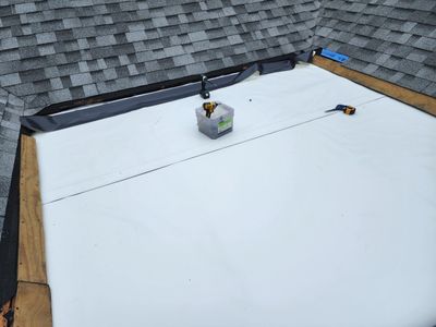 Residential Roofing Installation using 50 mil PVC
