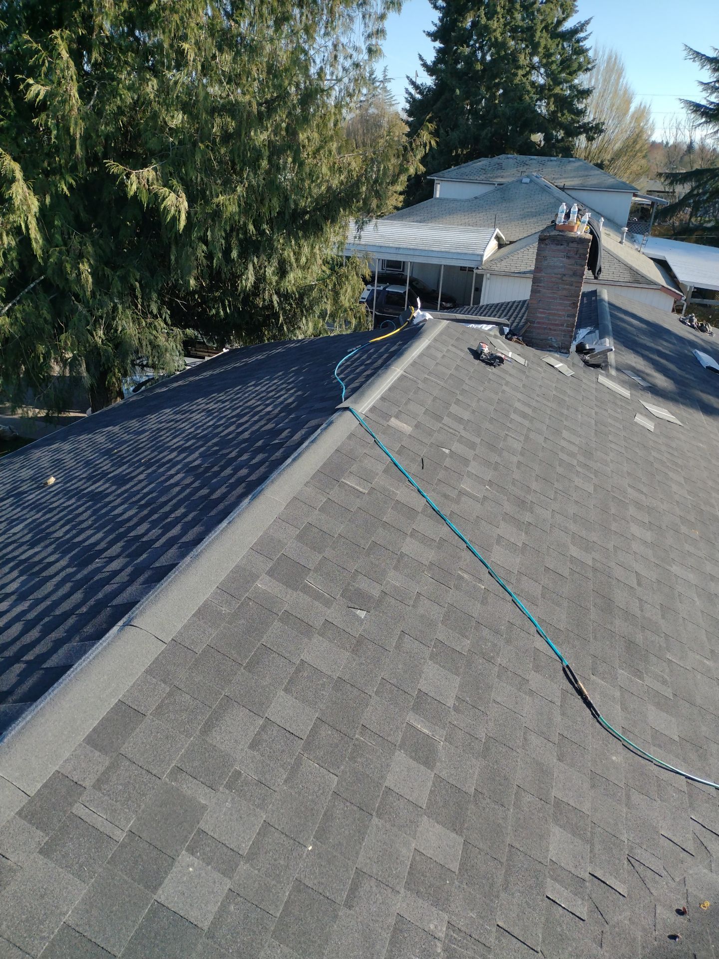 Residential Roofing Installation using IKO Dynasty (Color: Granite Black) by Orezona Building & Roofing Company, Inc.