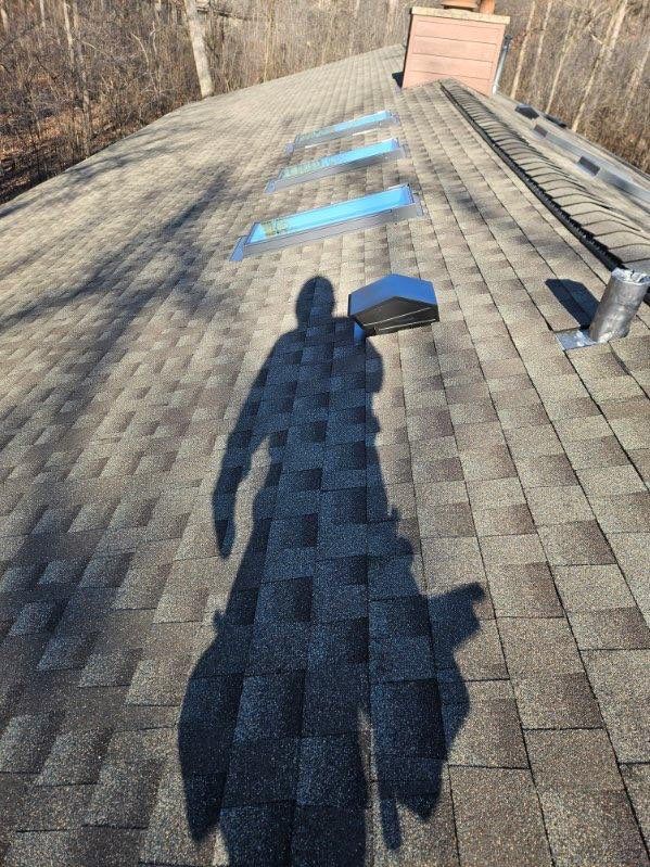 Asphalt Roof Replacement by Custom Installations