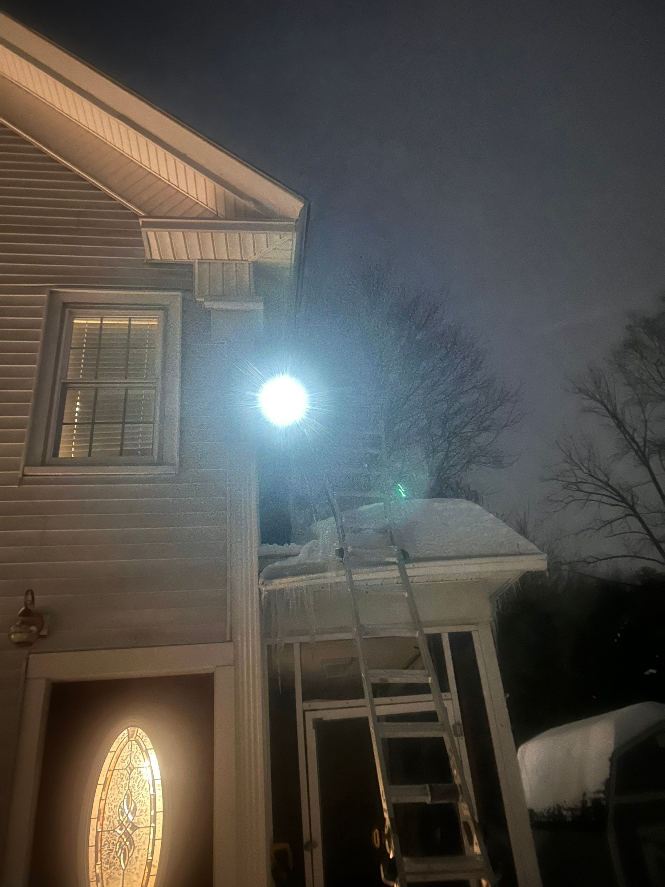 Snow and Ice dam removal by Mighty Dog Roofing of Greater Middlesex County