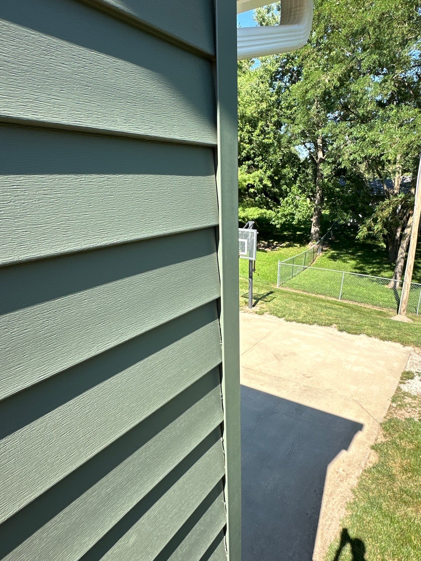 New Craneboard Siding on this Platte City, Mo home  by EEC  Windows, Siding & Roofing 