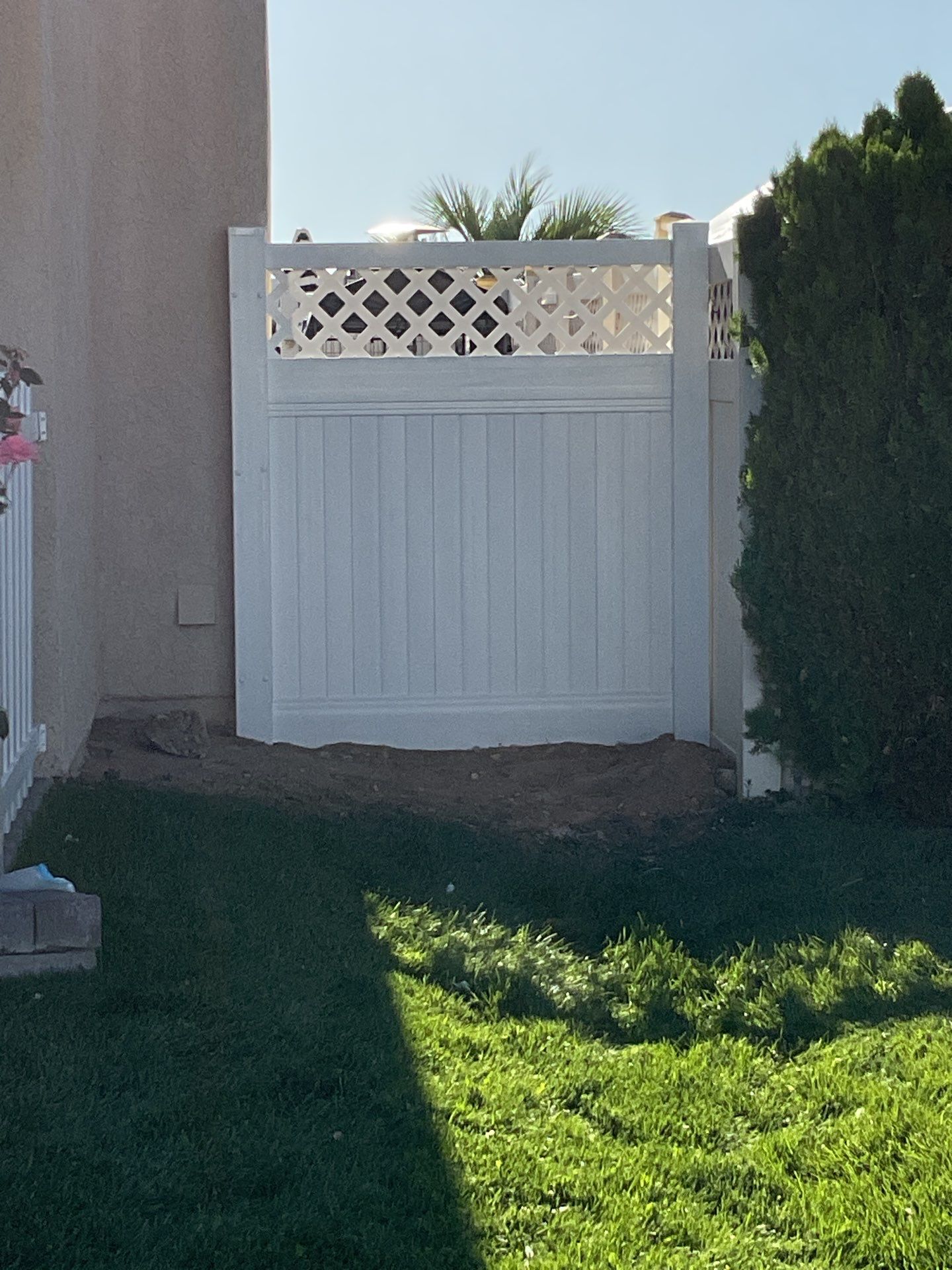 Lattice Vinyl with Privacy Vinyl Fence by Fence Guys Inc.