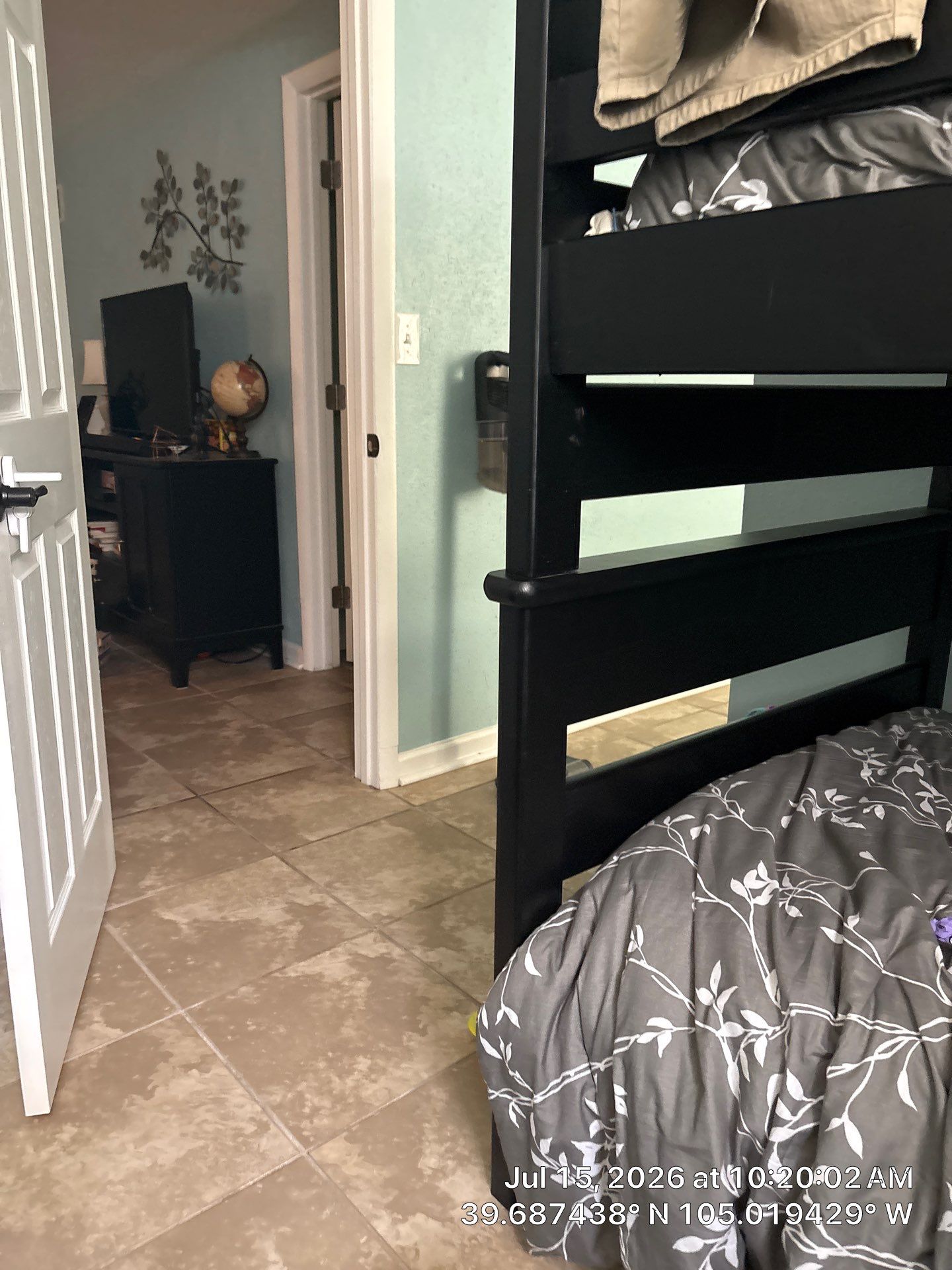 Denver Interior Bedroom Remodel Featuring New Paint and Tile Flooring by CompanyCam Sales Demo