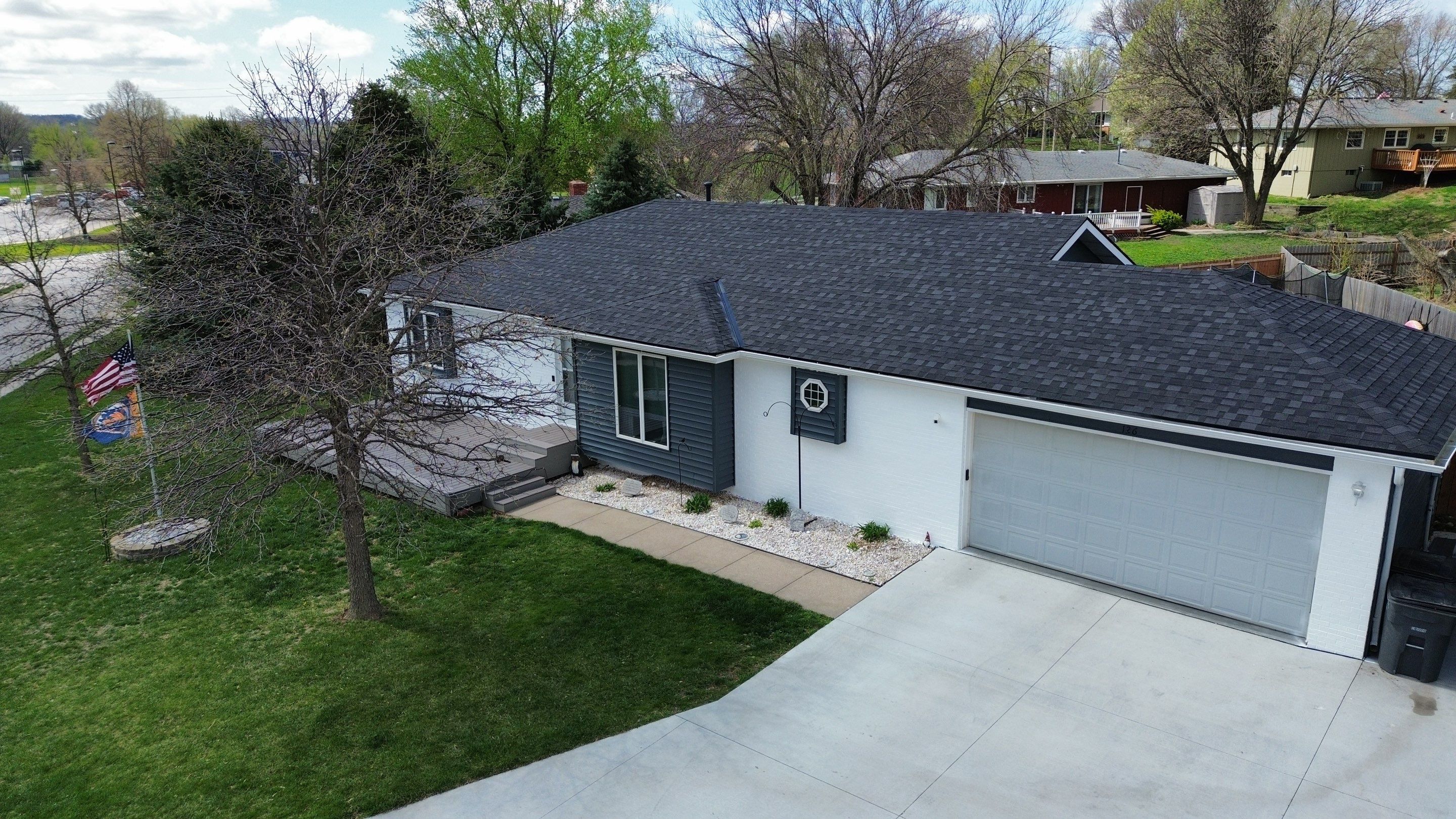 Roofing / Siding / Gutters using IKO Dynasty Granite Black / Norandex Siding by Lightning Exteriors