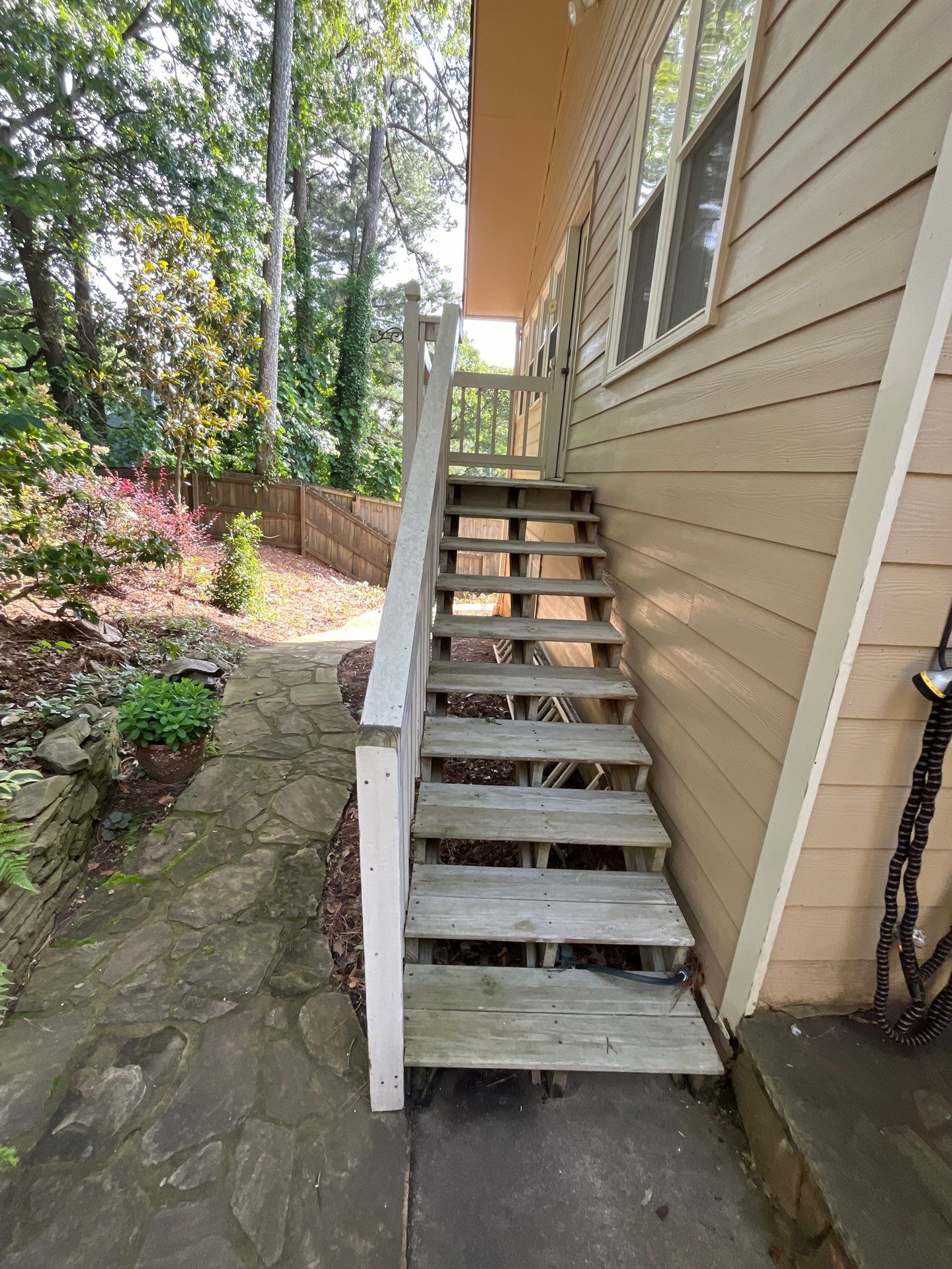 Rotted Wood Replacement, Deck Stain, and Exterior Paint Project in Kennesaw, GA by Nelson Exteriors 
