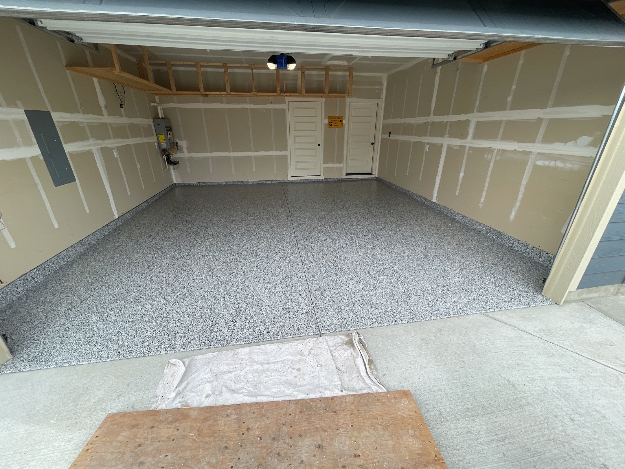 Garage Transformation using Domino by Croc Coatings, LLC