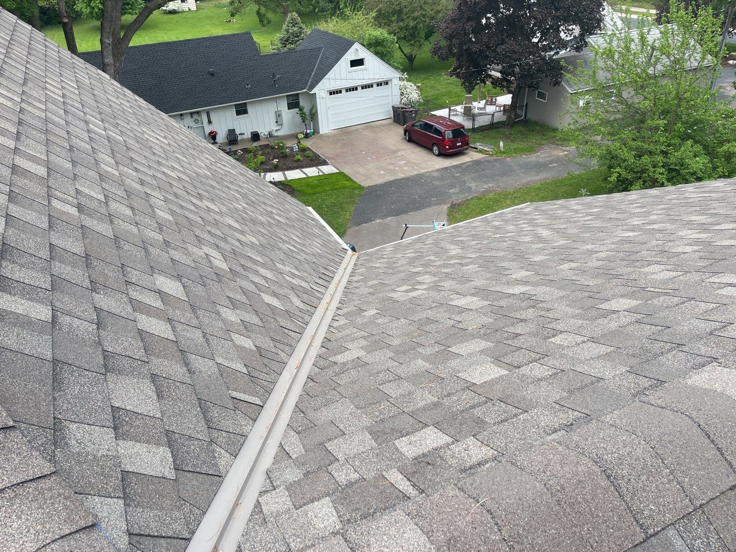 Chanhassen, MN – Roof Replacement with Gutter Guard Upgrade by First Impressions Exteriors
