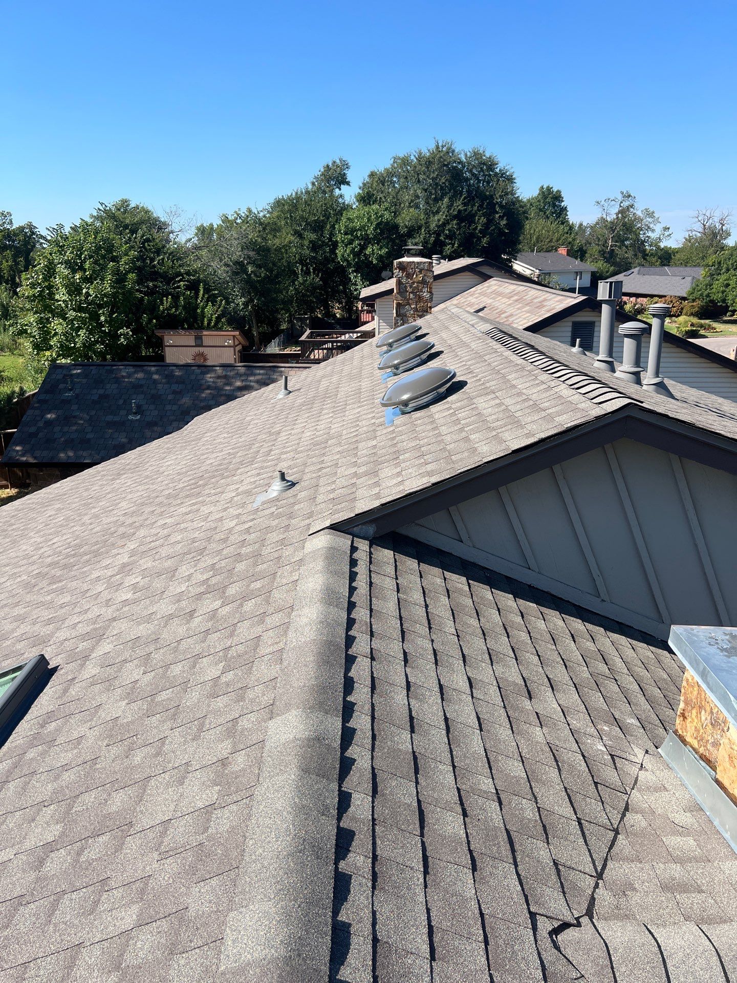 Roof Replacement and Skylight Replacement in Yukon by McCann's Roofing and Construction