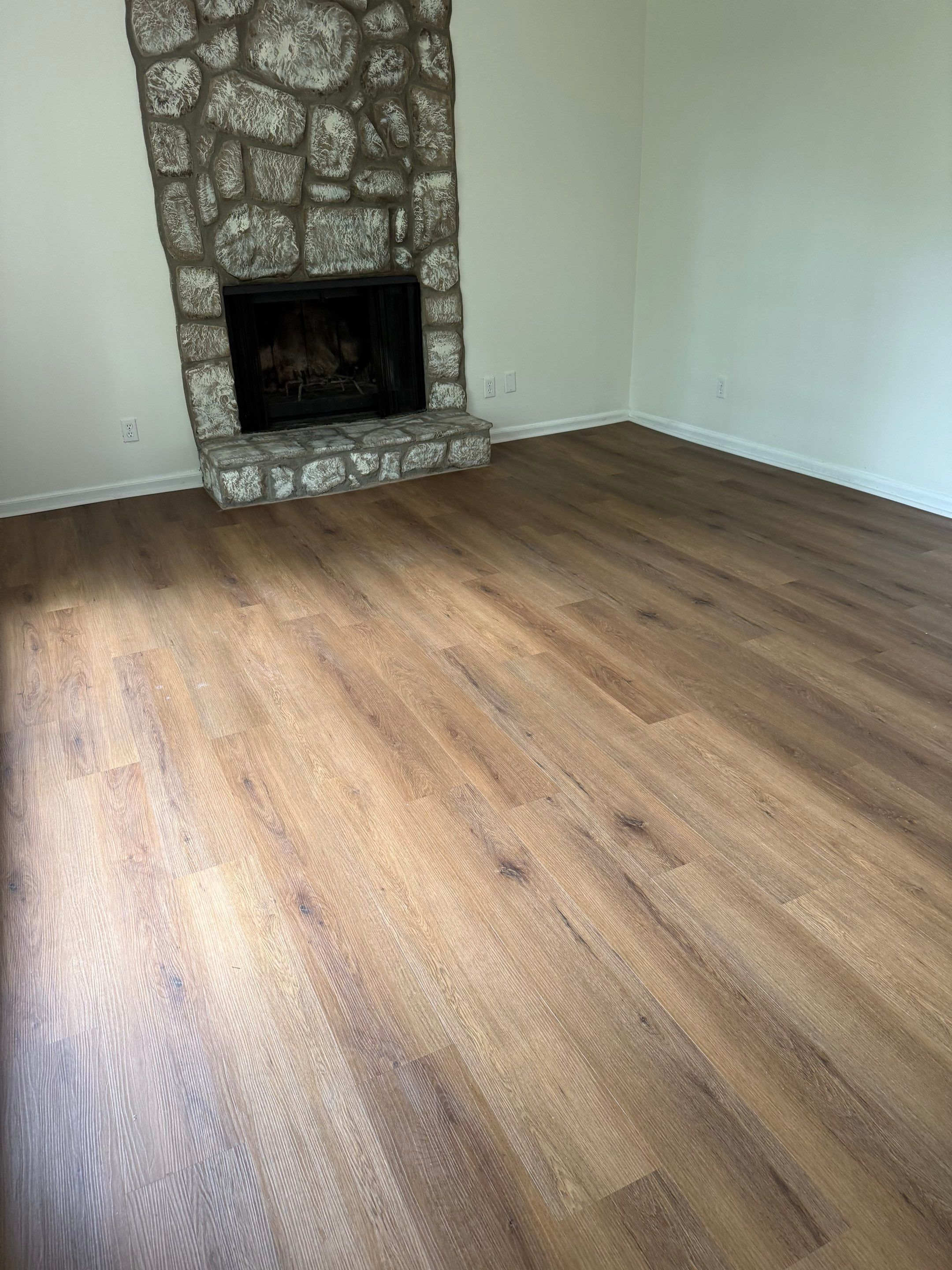 Complete Home Remodel Featuring Custom Kitchen and Wood-Look Plank Flooring by MAJO