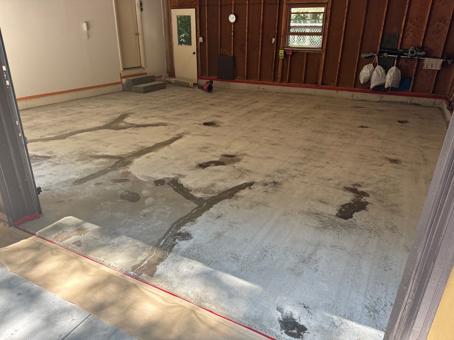 Grand Haven Garage Floor Renovation with Epoxy Flake Coating by Gordon Painting