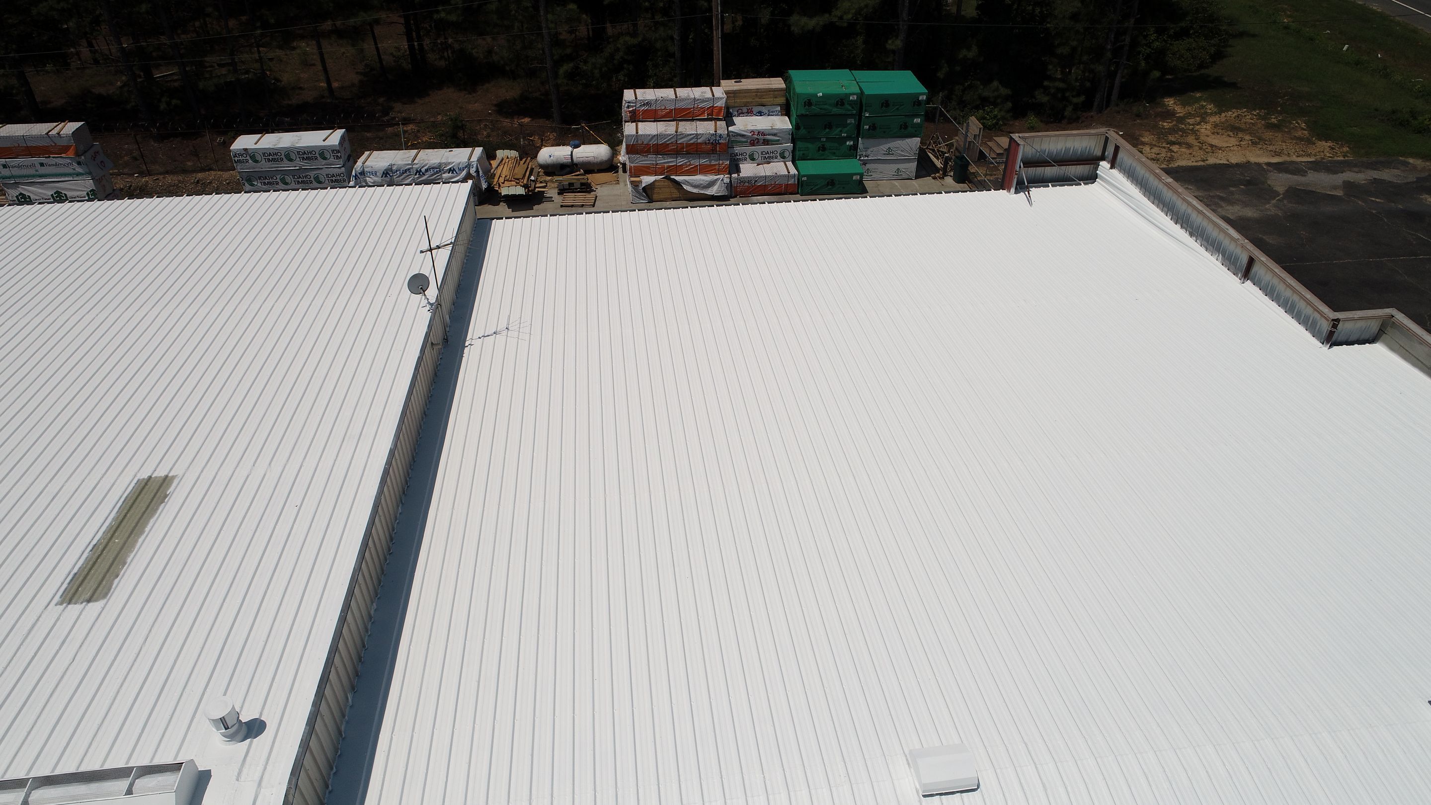Commercial Roofing Installation using Aldocoat Coatings by Hostetler Roofing